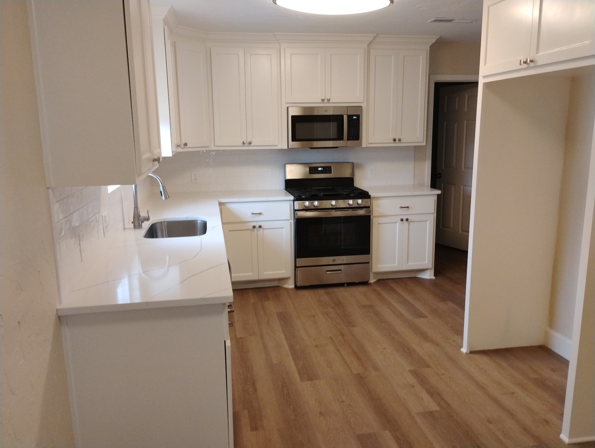 Bright White Quartz Kitchen — after